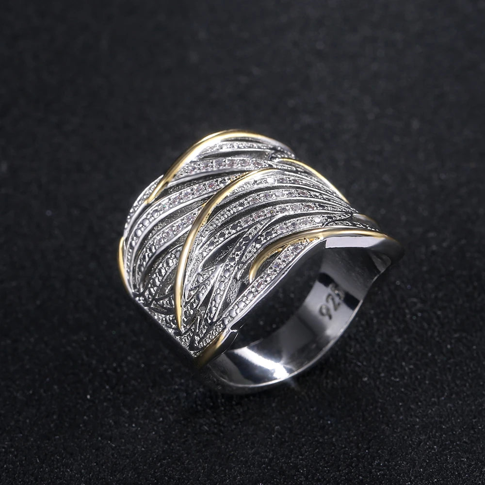 Bague Élégance Bicolore – Design Entrelacé Or & Argent