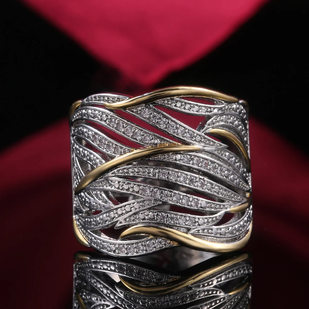 Bague Élégance Bicolore – Design Entrelacé Or & Argent