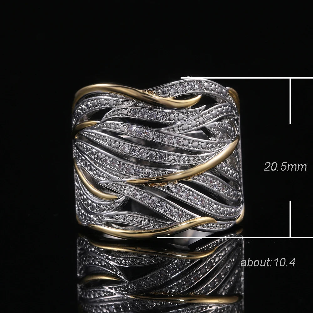 Bague Élégance Bicolore – Design Entrelacé Or & Argent