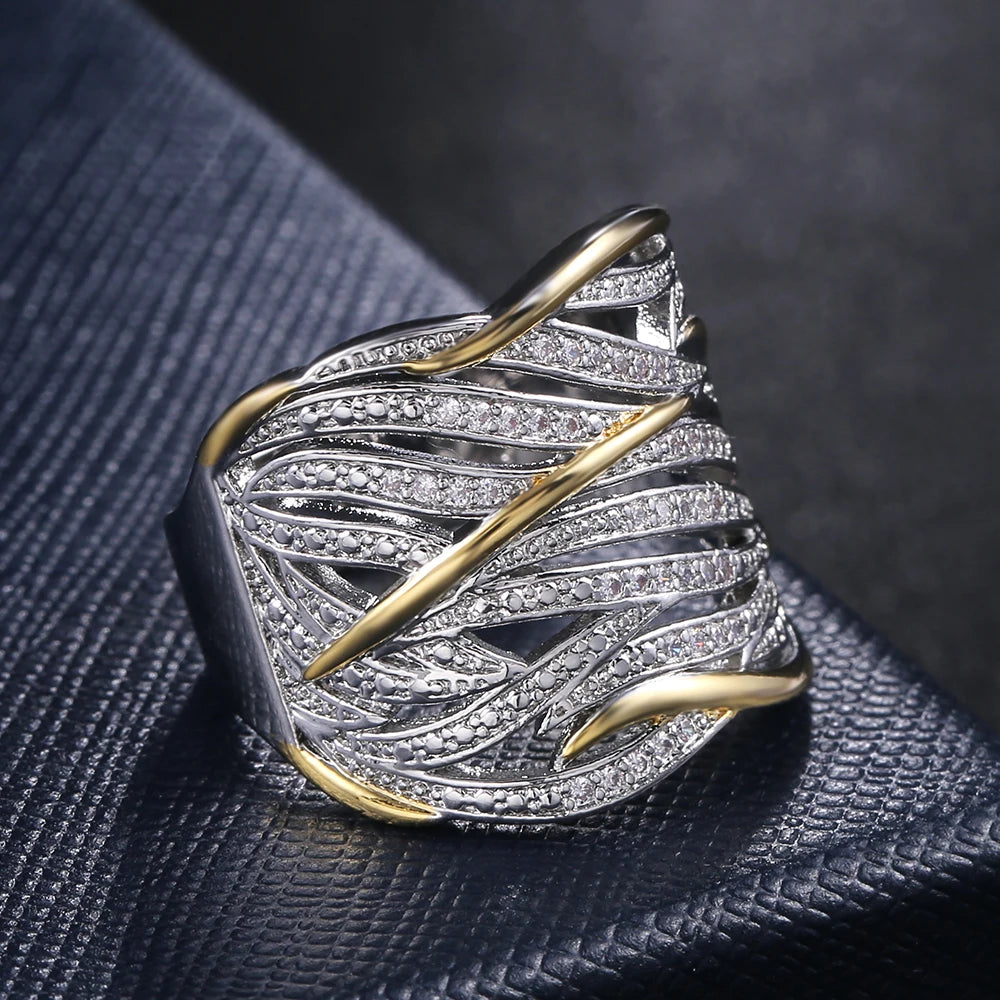 Bague Élégance Bicolore – Design Entrelacé Or & Argent