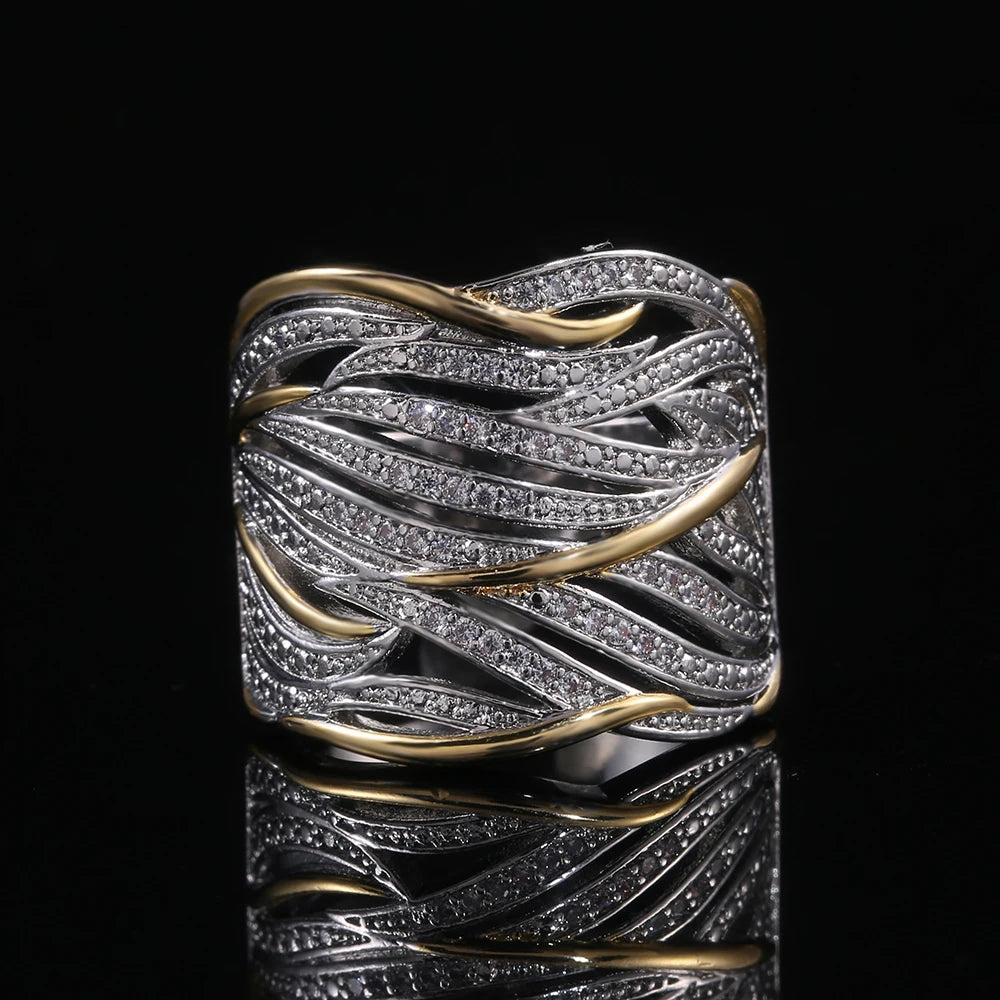 Bague Élégance Bicolore – Design Entrelacé Or & Argent